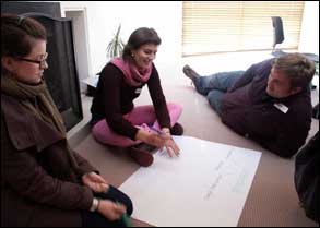 A group of teachers sharing their ideas