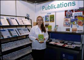 Jane Stewart proudly displays the new Ollie's Island CD ROM Program at the AWA stand at the OzWater Conference in Sydney.