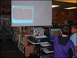 Ollie Program on large screen at Earth Week celebrations