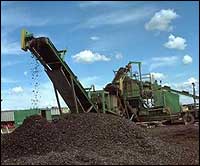 A tire chipper breaks up old tires for recycling into fuel