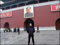 Peter Broadbent under the famous image of Mao Tse Tung (also Mao Zedong)