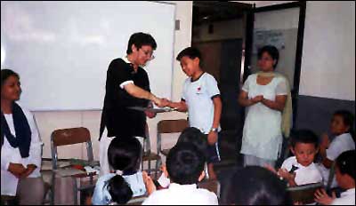 Gigi Warne with year 6 students