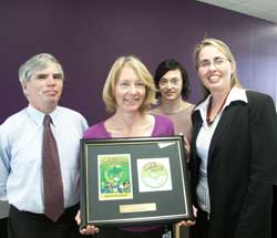 Stewart Chapman, Karen Civil and Jennie Gilles from the ACT Government, Department of Territory and Municipal Services, Sustainability Policy and Programs receiving their supporter award