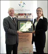 Peter Holdsworth receiving the supporter award for Animal Health Alliance (Australia)