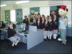 Ollie with students and teachers